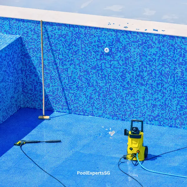Pool cleaning with brush and water jet