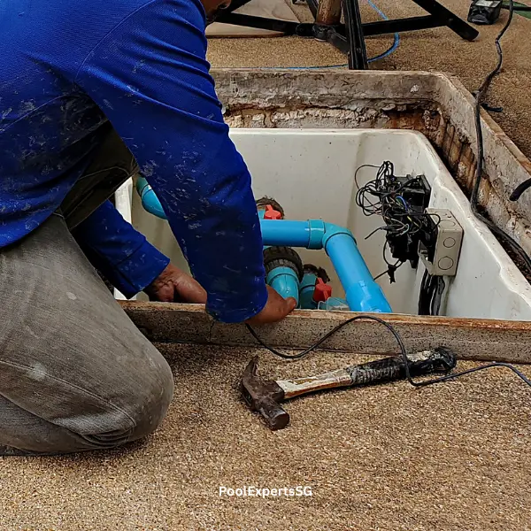 Pool technician doing repair works